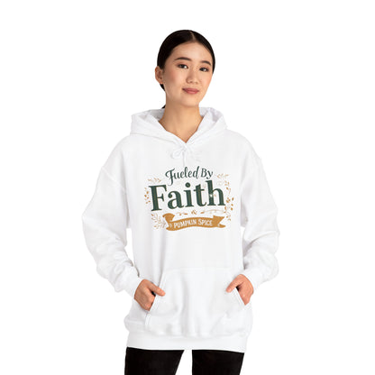 Woman modeling white “Fueled by Faith & Pumpkin Spice” hoodie — soft Christian hoodie for cozy fall days and pumpkin spice season.