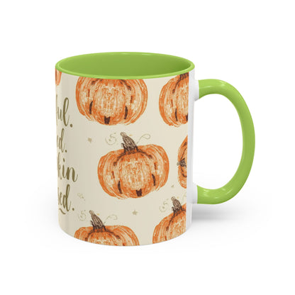 Grateful, Blessed & Pumpkin Obsessed 11oz green accent mug — autumn-themed coffee cup with orange pumpkins and sage green interior.