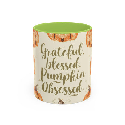 Grateful, Blessed & Pumpkin Obsessed 11oz green accent mug — autumn-themed coffee cup with orange pumpkins and sage green interior.