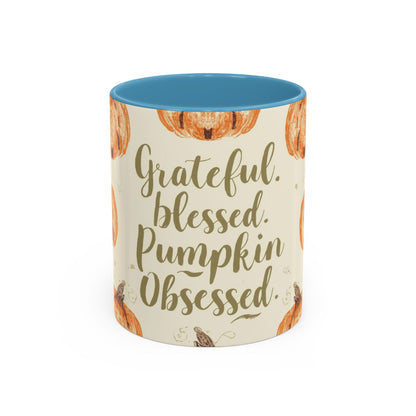 Grateful, Blessed & Pumpkin Obsessed 11oz light blue accent mug — autumn coffee cup with orange pumpkins and cozy fall design.