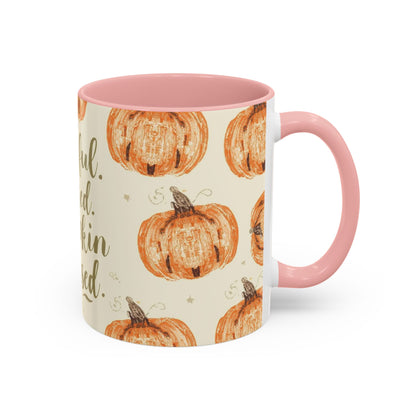Grateful, Blessed & Pumpkin Obsessed 11oz light pink accent mug — cozy fall coffee cup featuring orange pumpkin design and pink handle.