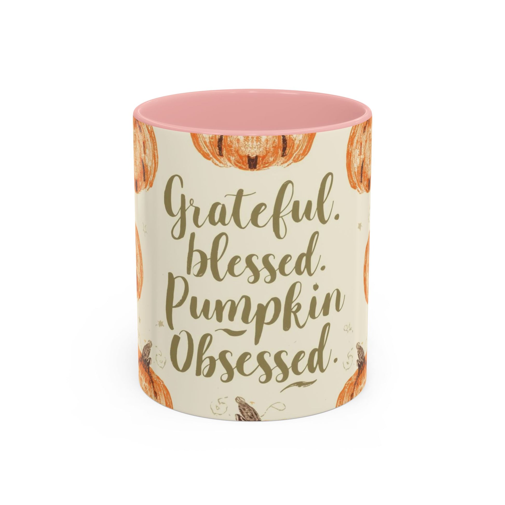 Grateful, Blessed & Pumpkin Obsessed 11oz light pink accent mug — cozy fall coffee cup featuring orange pumpkin design and pink handle.