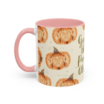 Side view of Grateful, Blessed & Pumpkin Obsessed 11oz light pink mug — autumn drinkware with rustic pumpkins and warm cream background.