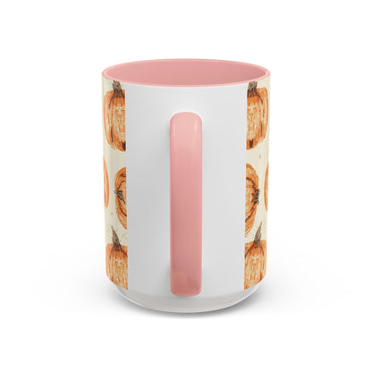Back view of Grateful, Blessed & Pumpkin Obsessed light pink accent mug — cream background with orange pumpkin pattern and pink handle.