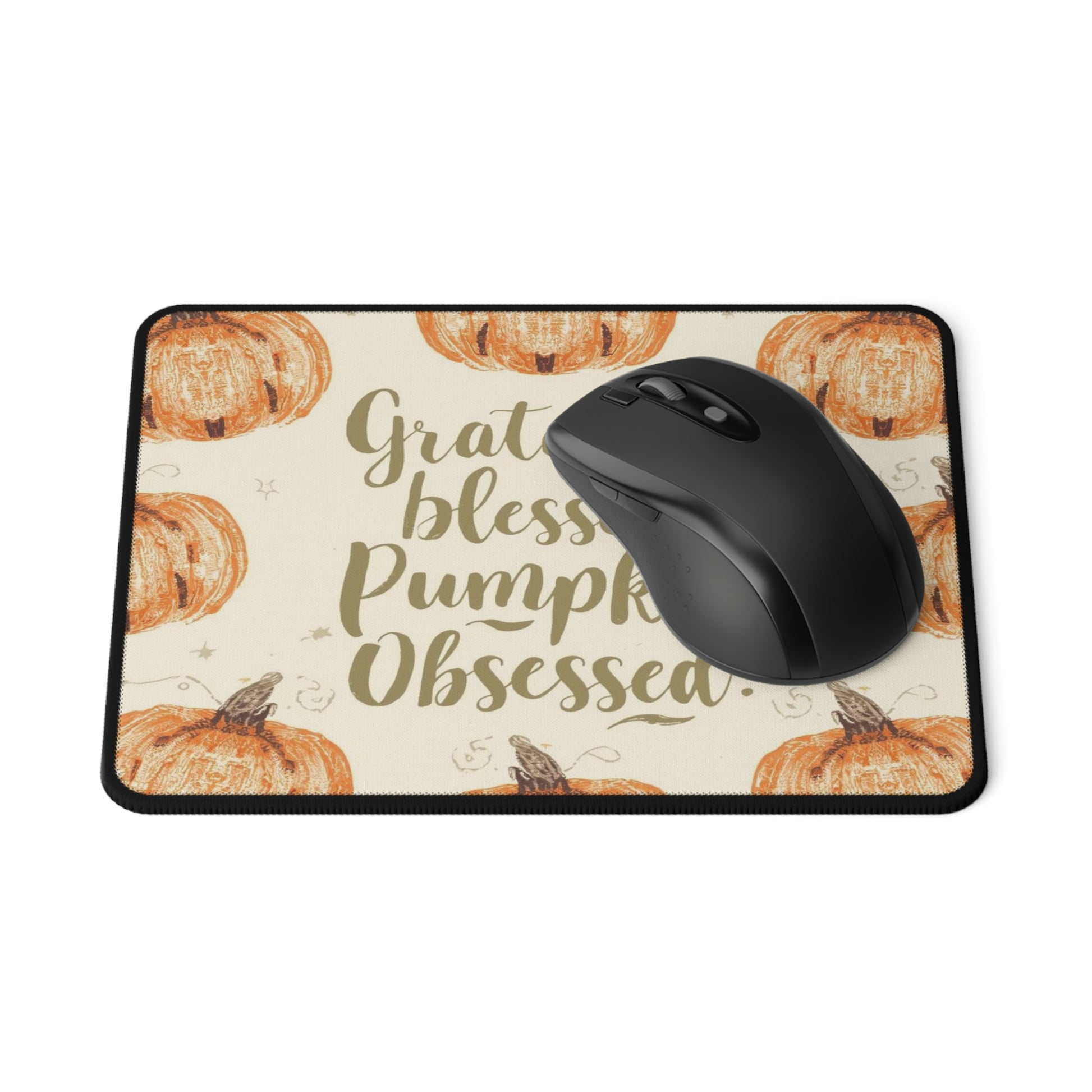Flatlay of Grateful, Blessed & Pumpkin Obsessed mouse pad with wireless mouse — perfect fall office accessory featuring orange pumpkins and soft surface.