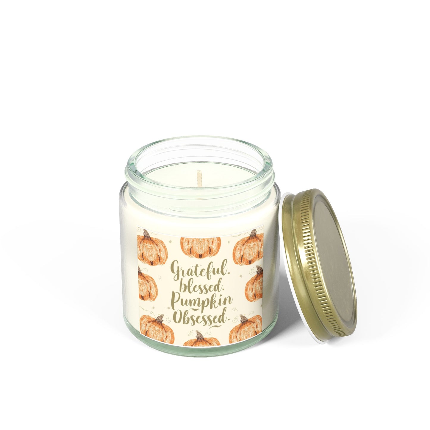 Clear glass “Grateful, Blessed & Pumpkin Obsessed” 4oz candle with gold lid — spiced cinnamon chai scented candle with cozy pumpkin design.