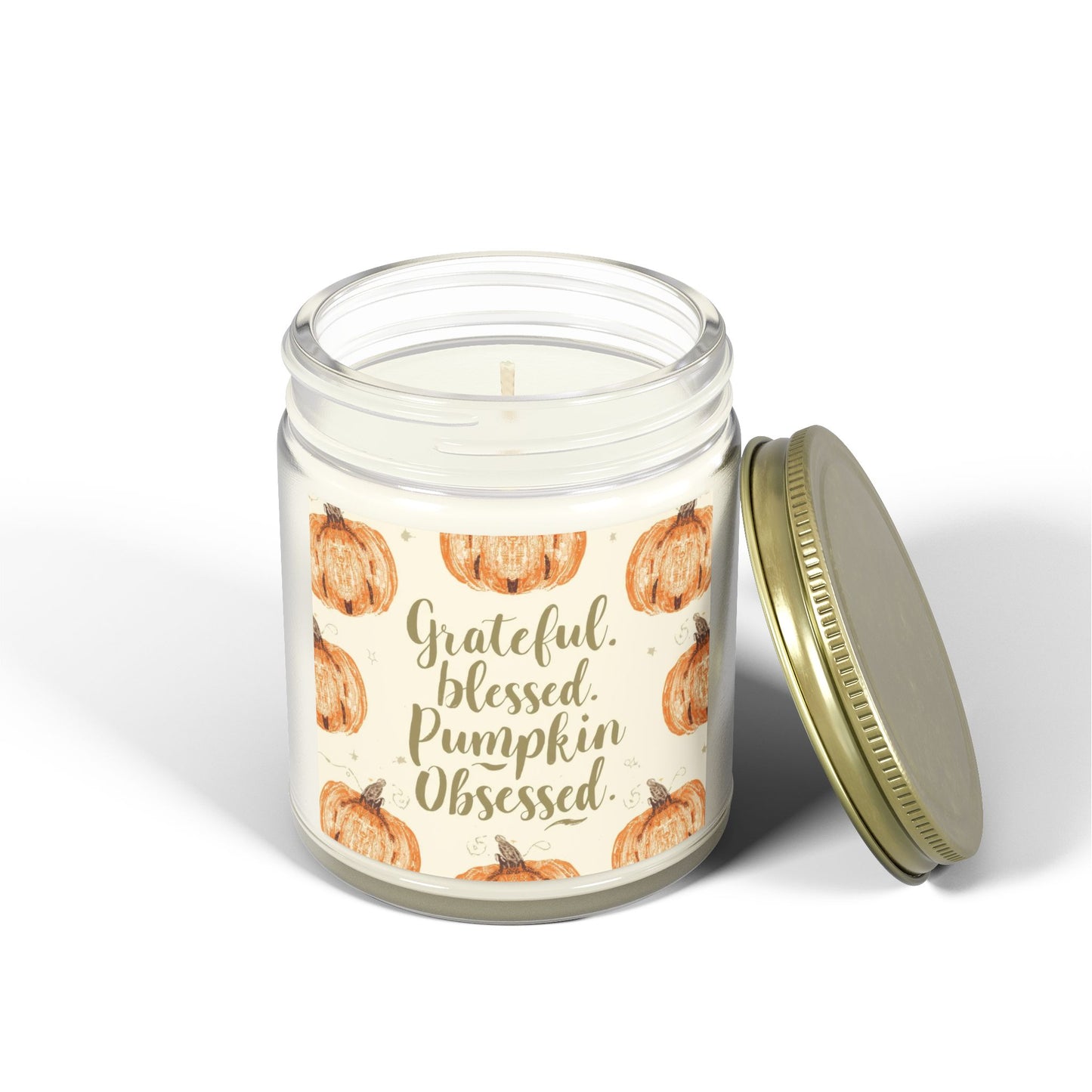 Clear glass “Grateful, Blessed & Pumpkin Obsessed” 9oz candle with gold lid — fragrance-free fall candle with pumpkin design for calm, clean burning.