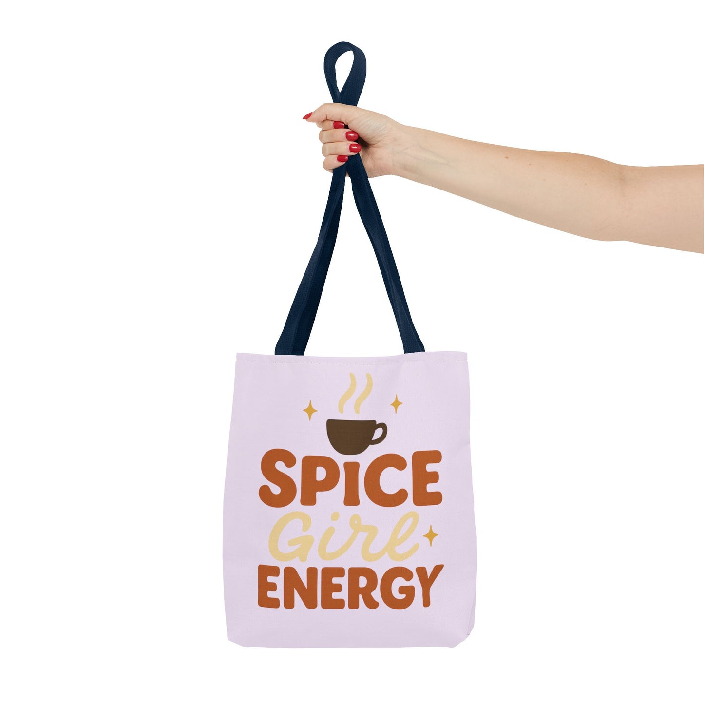 Navy-handled “Spice Girl Energy” tote bag held in hand — lilac coffee-inspired fall tote with soft aesthetic and motivational vibe.