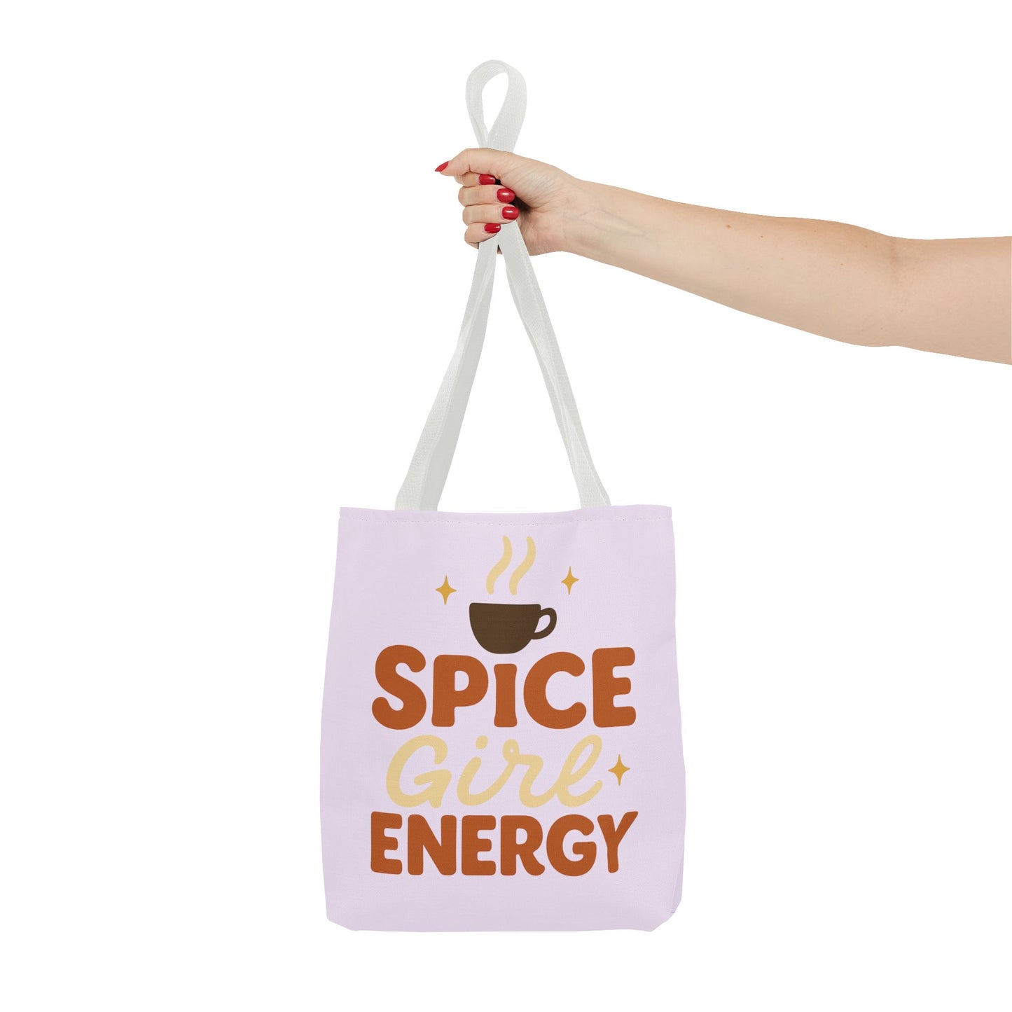 White-handled lilac “Spice Girl Energy” tote bag held in hand — feminine pastel tote for fall outfits and everyday coffee runs.