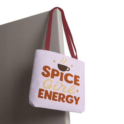 “Spice Girl Energy” tote bag with red straps hanging on wall — lilac coffee-inspired tote bag perfect for fall gifting and daily use.