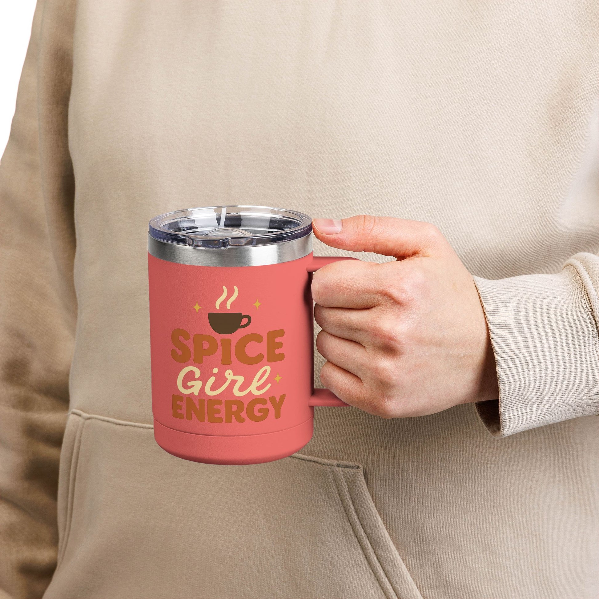 Person holding coral “Spice Girl Energy” insulated mug — stylish and durable fall coffee cup perfect for pumpkin spice lovers.