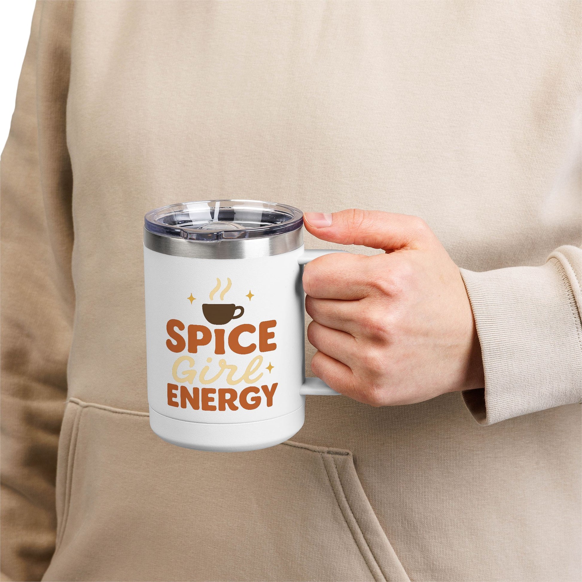 Person holding white “Spice Girl Energy” insulated mug — stylish stainless steel coffee cup ideal for cozy fall mornings and latte lovers.
