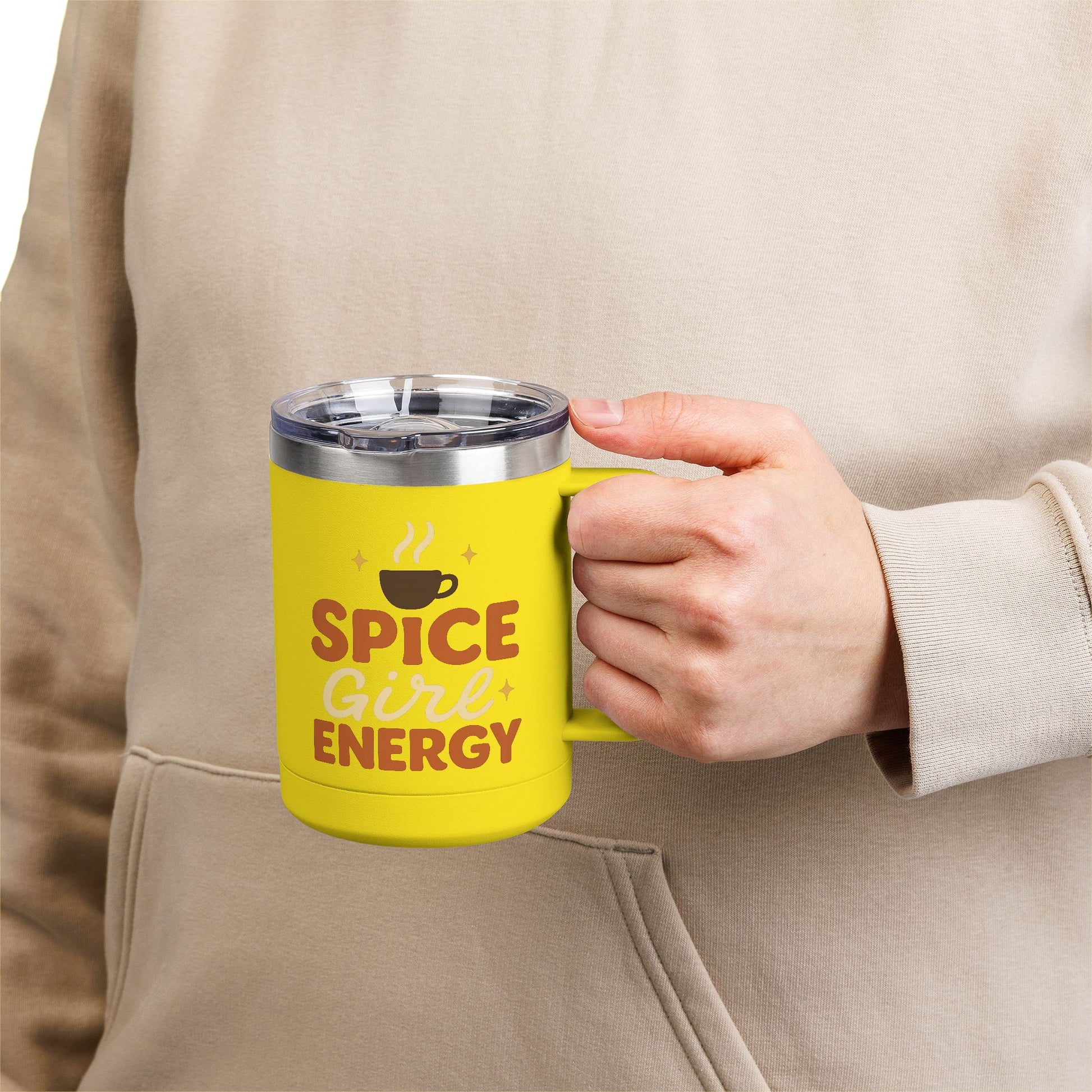 Person holding yellow “Spice Girl Energy” insulated mug — vibrant coffee mug for fall coffees, pumpkin spice lattes, and daily motivation.