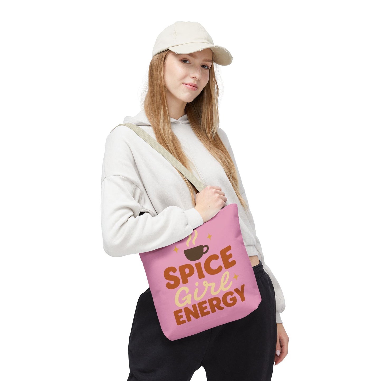 Woman wearing mauve “Spice Girl Energy” tote bag with beige handles — stylish fall accessory for coffee lovers and girl bosses on the go.