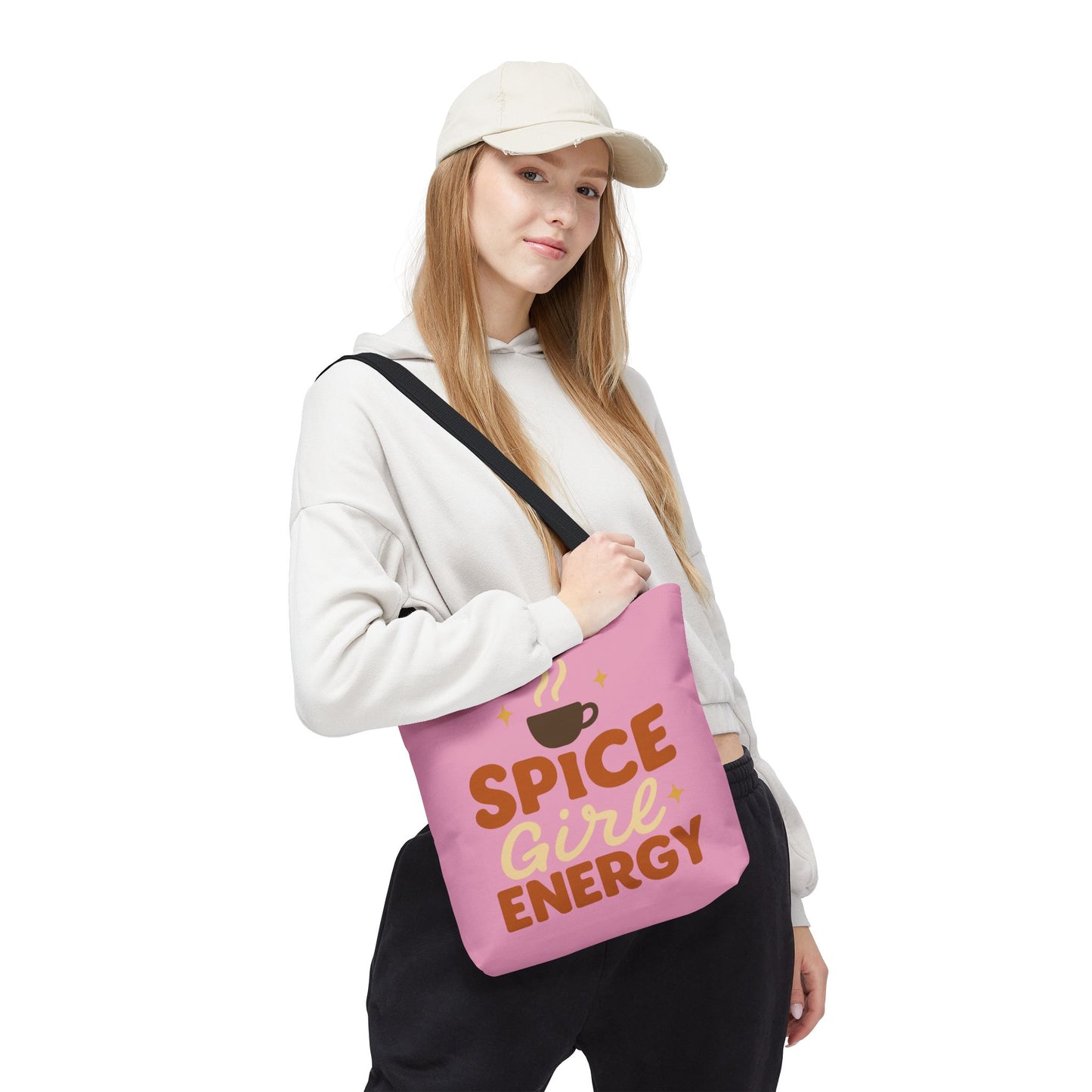 Model wearing mauve “Spice Girl Energy” tote bag with black handles — trendy pink tote for coffee runs, errands, and autumn outfits.