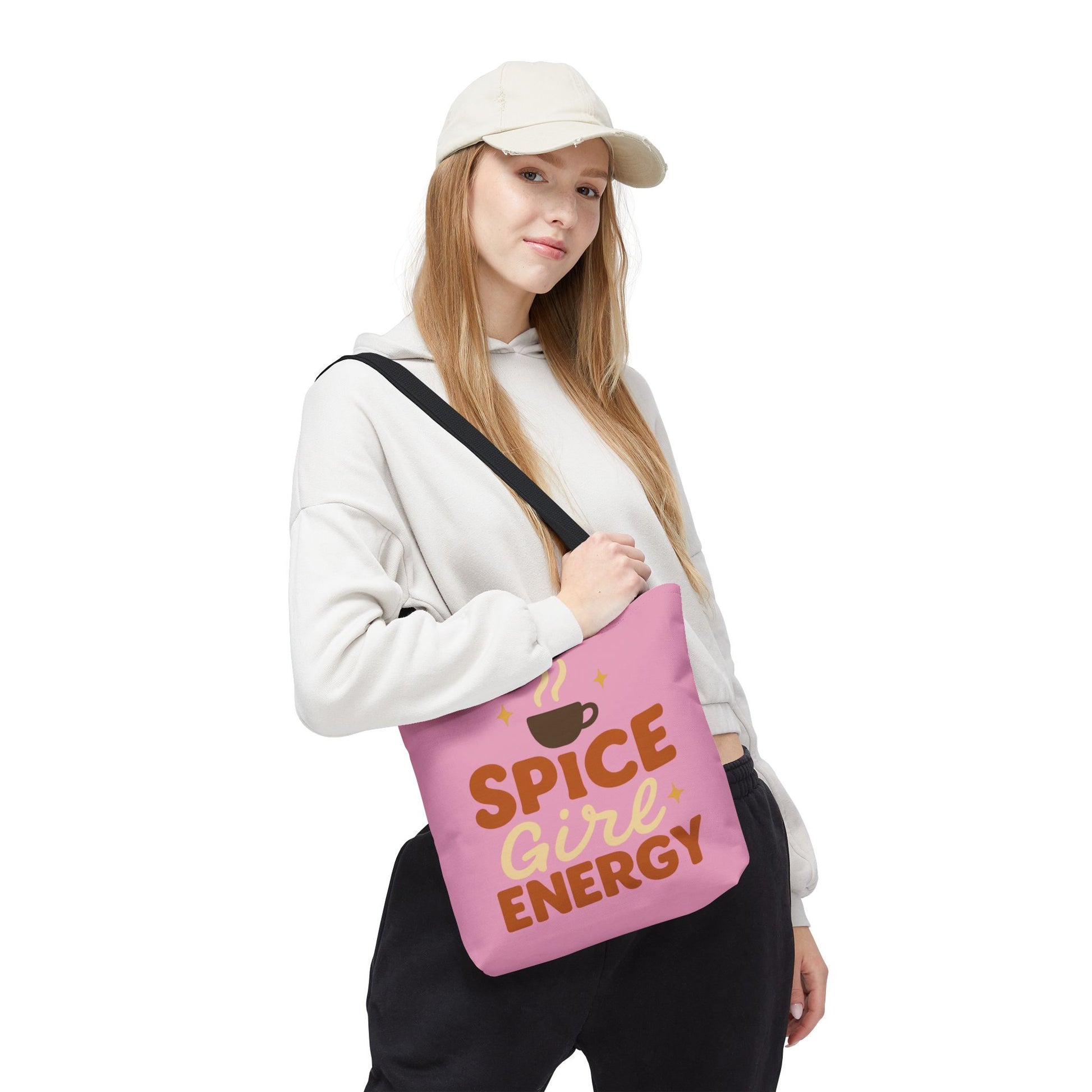 Model wearing mauve “Spice Girl Energy” tote bag with black handles — trendy pink tote for coffee runs, errands, and autumn outfits.