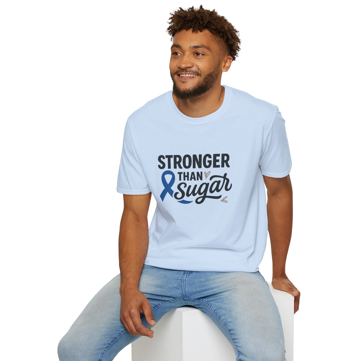 Man seated wearing Light Blue Stronger Than Sugar t-shirt — soft cotton-blend awareness tee for diabetes warriors and supporters alike.