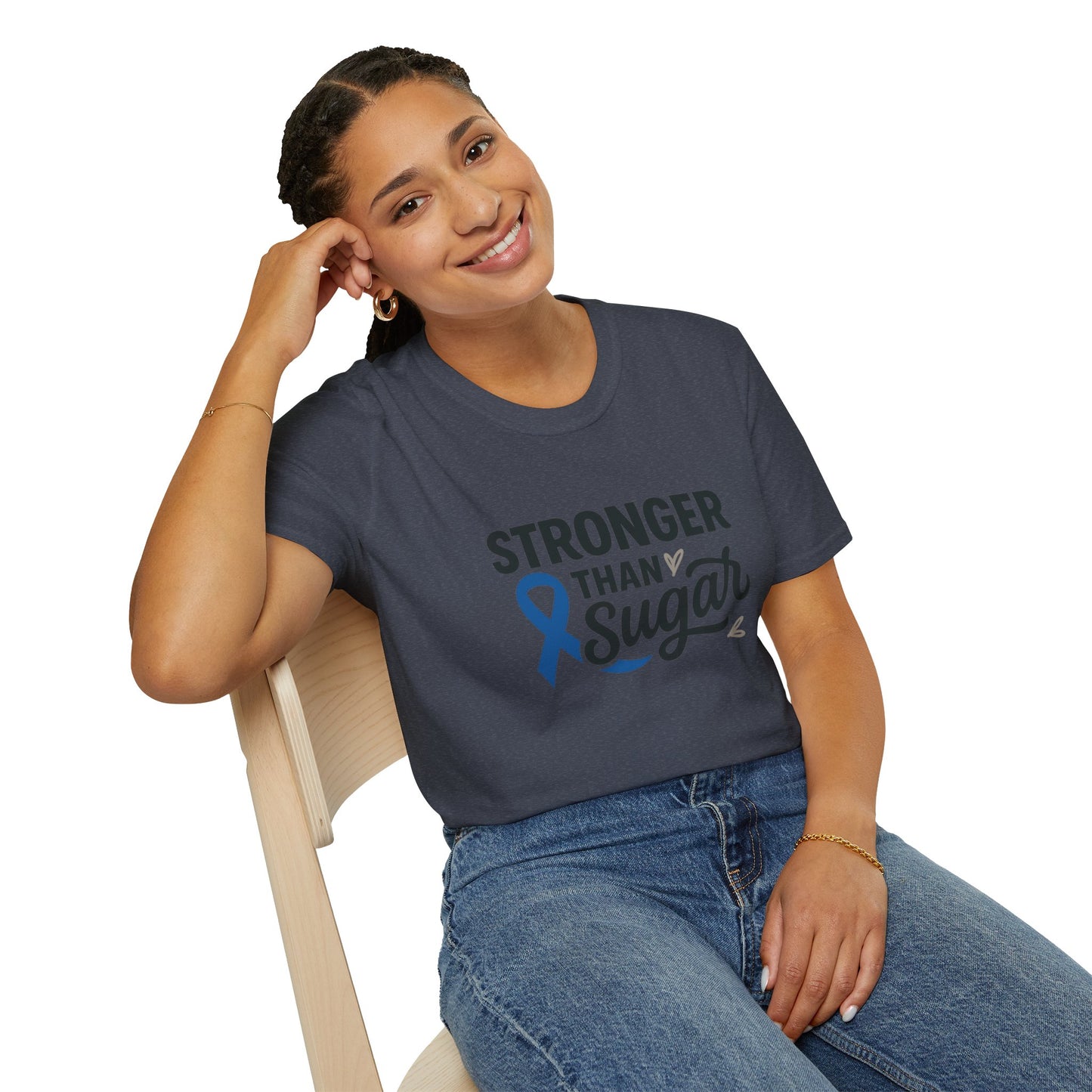 Smiling woman seated wearing Heather Navy Stronger Than Sugar t-shirt — comfortable awareness apparel celebrating hope and health empowerment.