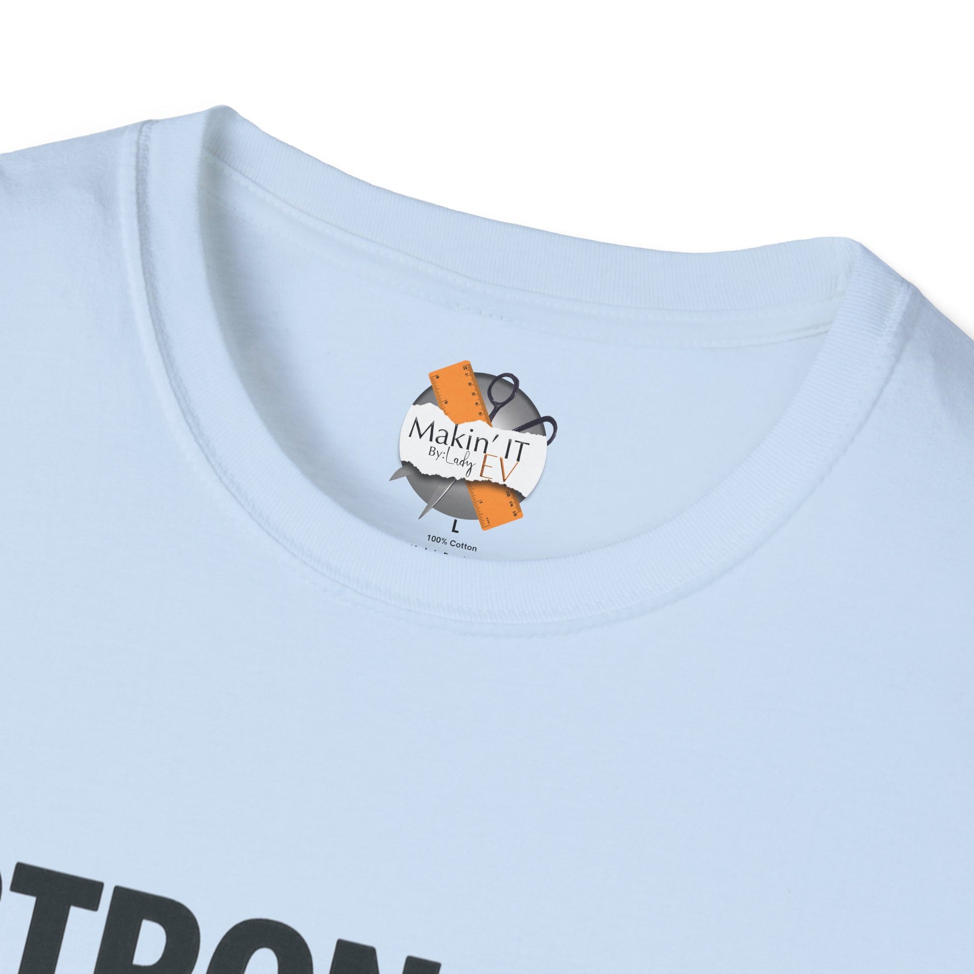 Close-up of Makin’ It By Lady Ev neck label inside Light Blue Stronger Than Sugar t-shirt — premium cotton-blend awareness apparel featuring brand logo.