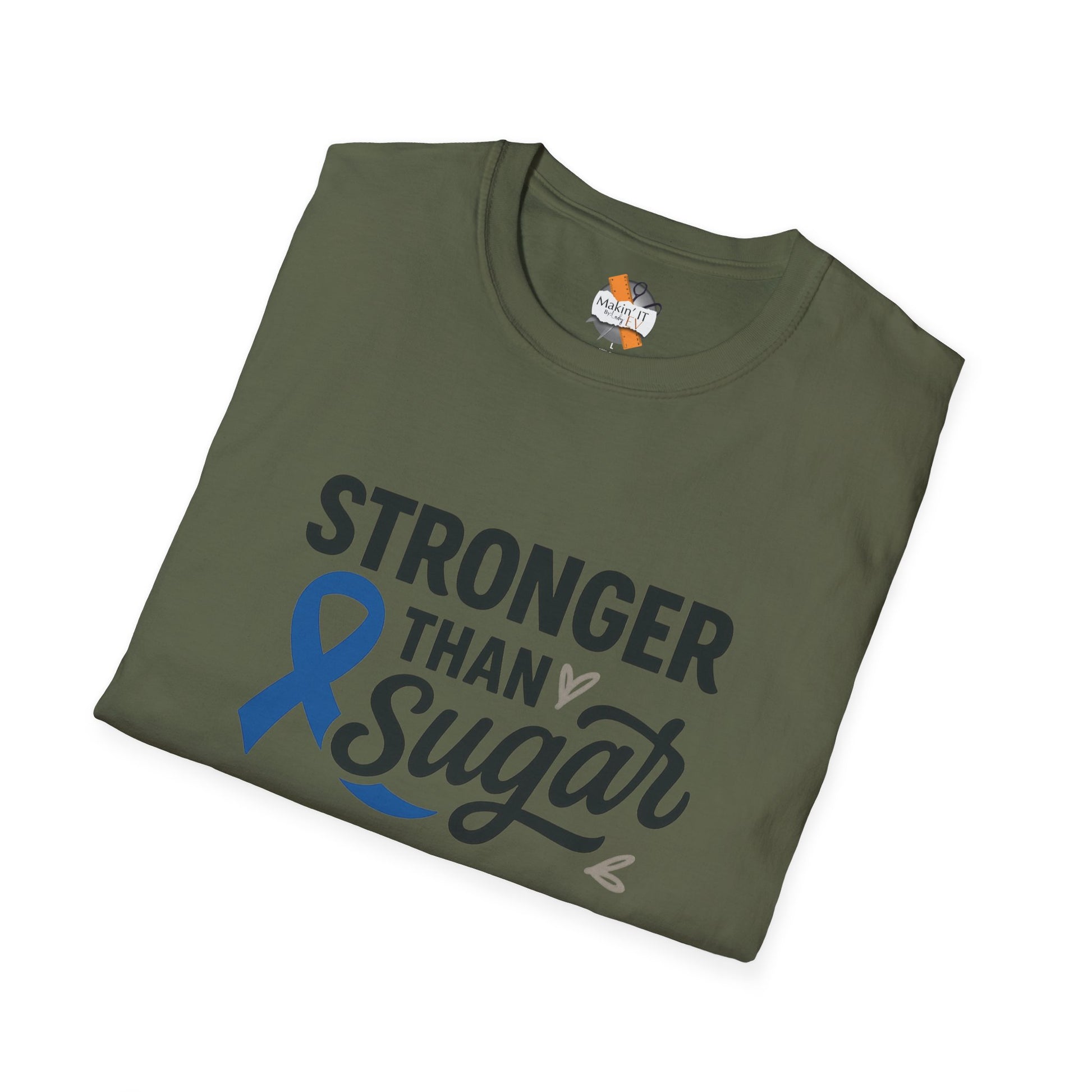 Folded Military Green Stronger Than Sugar t-shirt — soft awareness tee with blue ribbon design promoting diabetes strength and hope.