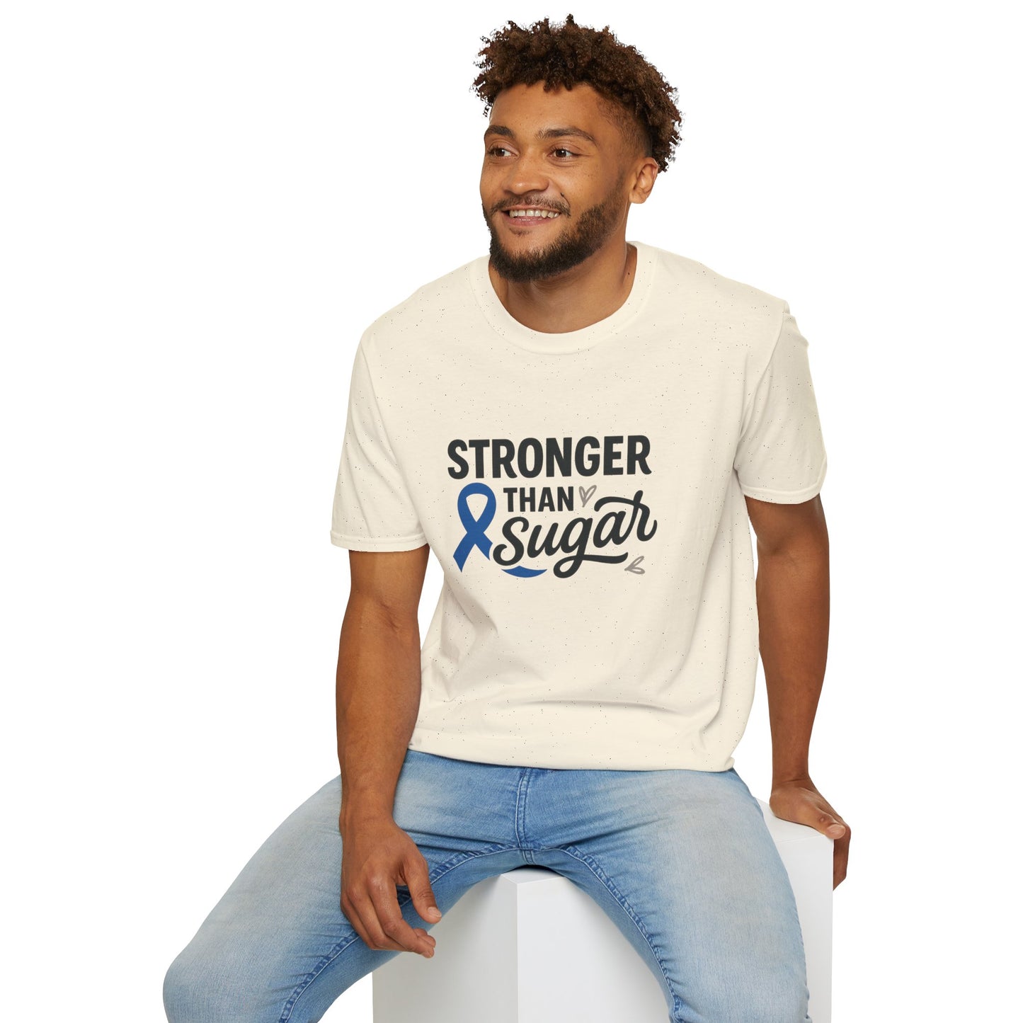 Man seated wearing Natural Stronger Than Sugar t-shirt — soft cotton-blend awareness tee for diabetes warriors and supporters alike.