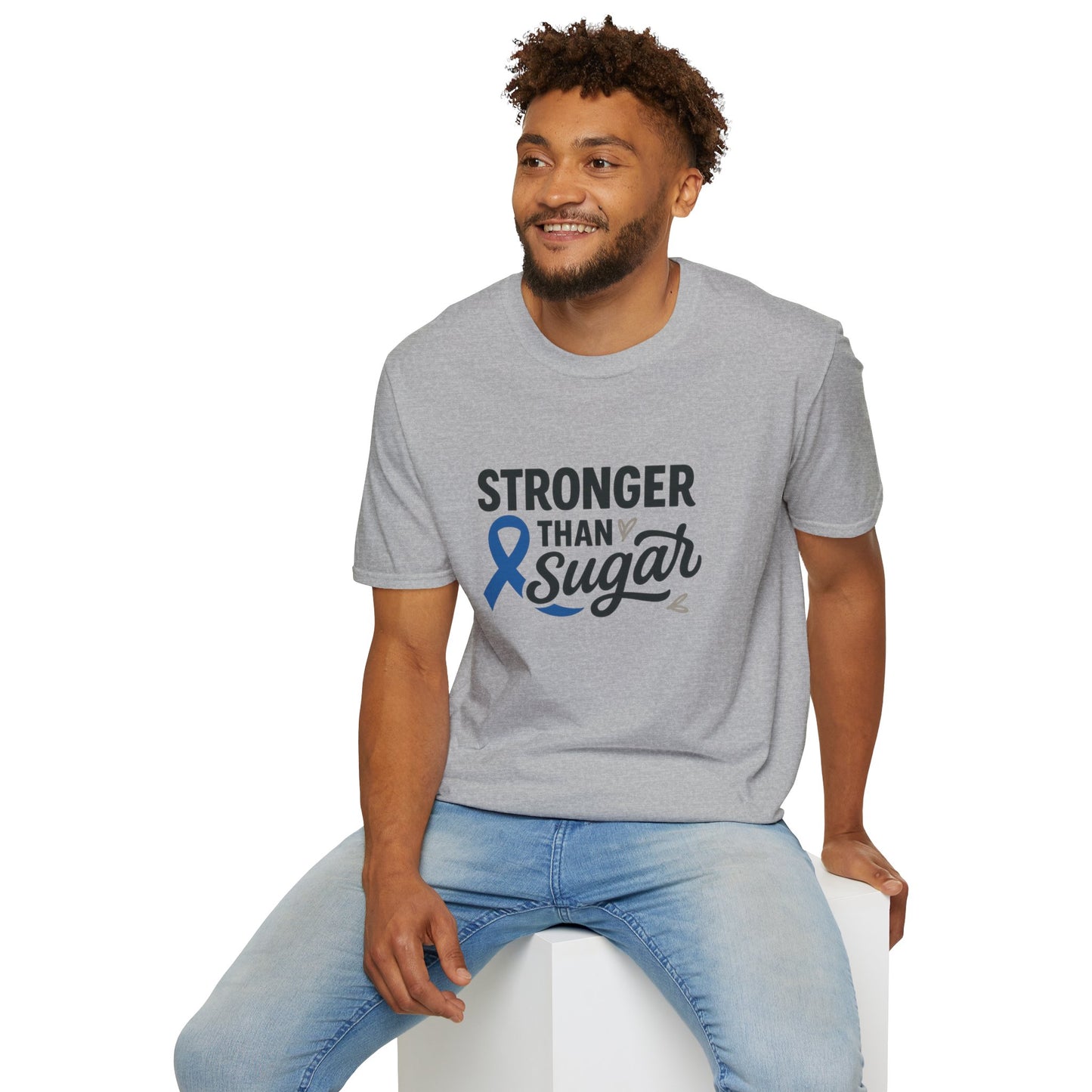 Man seated wearing Sport Grey Stronger Than Sugar t-shirt — soft cotton-blend awareness tee for diabetes warriors and supporters alike.
