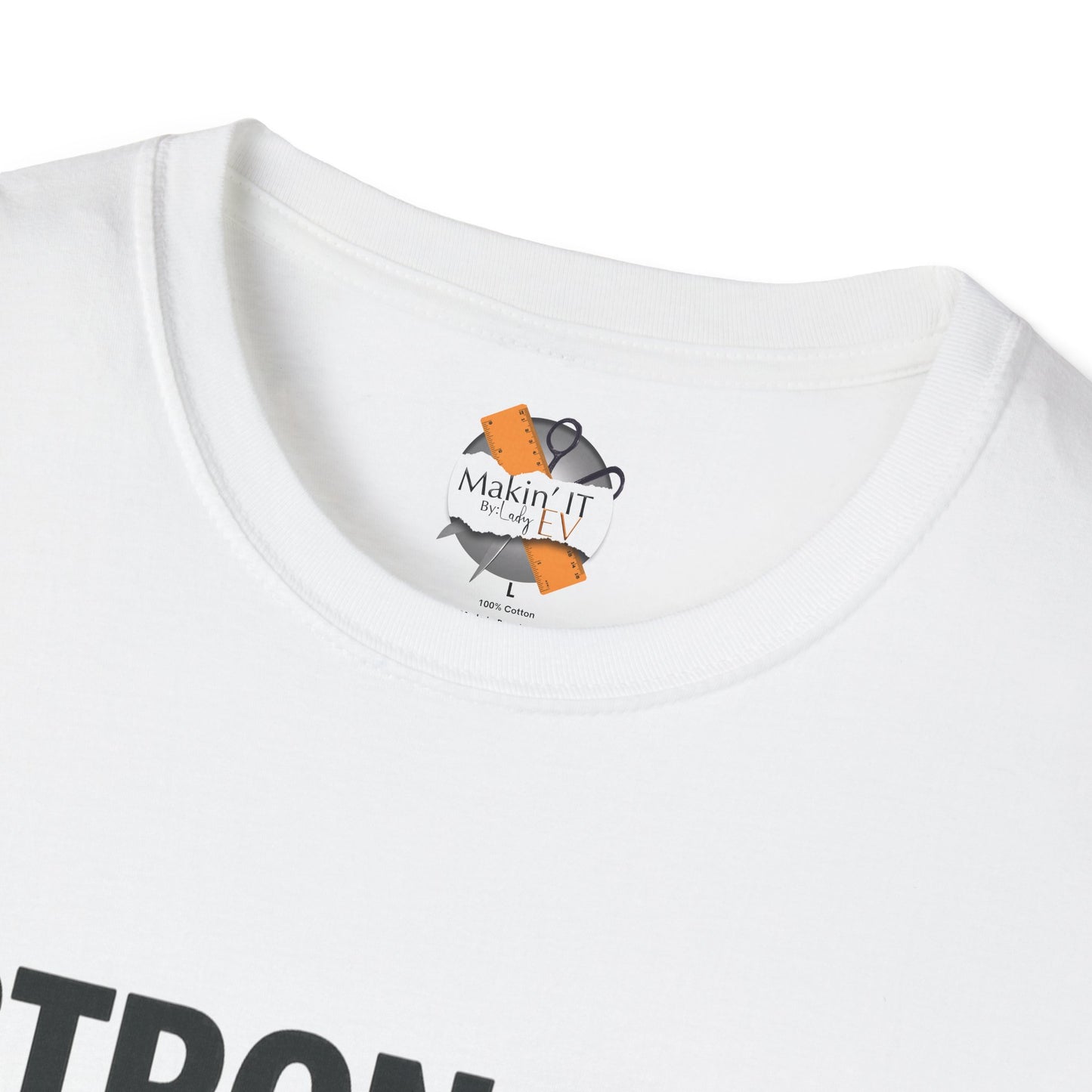 Close-up of Makin’ It By Lady Ev neck label inside White Stronger Than Sugar t-shirt — premium cotton-blend awareness apparel featuring brand logo.