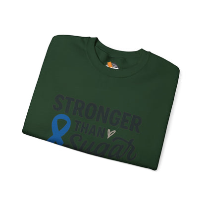 Folded forest green Stronger Than Sugar sweatshirt — soft fleece awareness apparel featuring blue diabetes ribbon and motivational message.