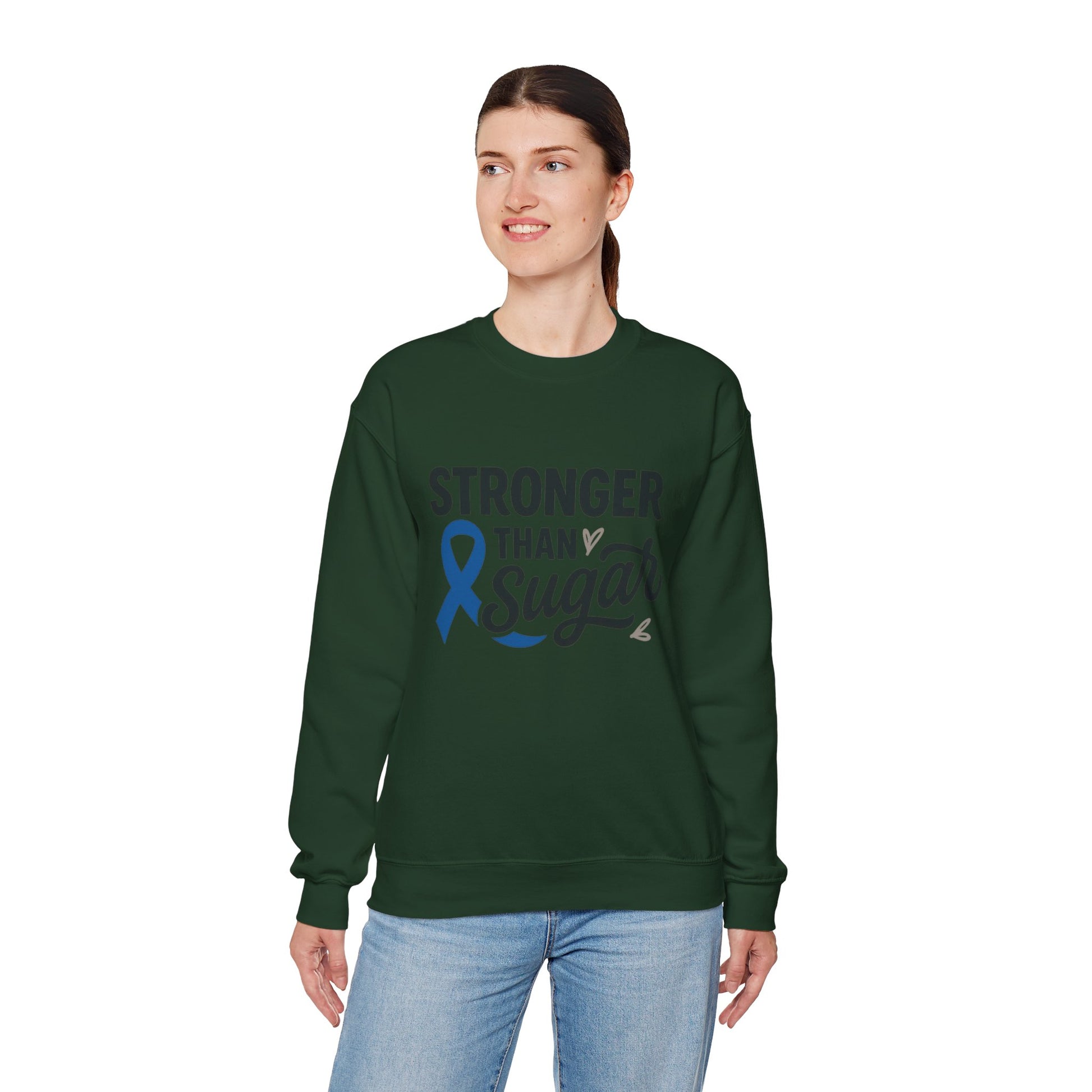Female model in forest green Stronger Than Sugar sweatshirt — unisex fleece sweater featuring diabetes awareness ribbon and message of resilience.