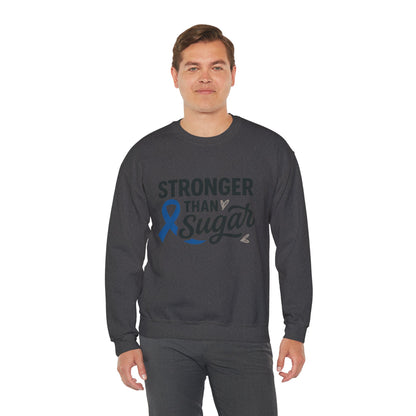 Male model wearing heather gray Stronger Than Sugar crewneck sweatshirt — unisex awareness sweater featuring blue ribbon design for diabetes advocacy.