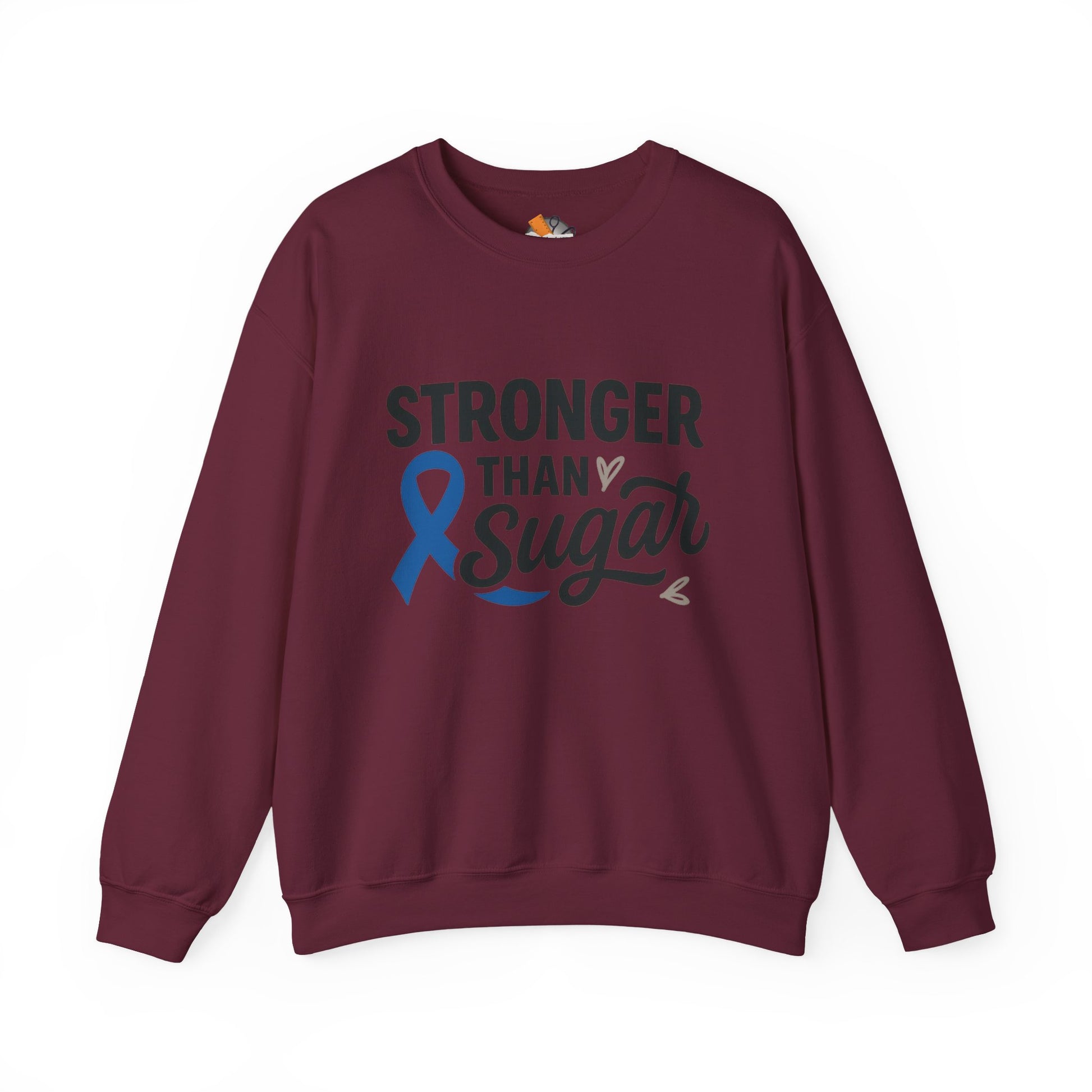 Main view of maroon Stronger Than Sugar crewneck sweatshirt — cozy unisex fleece for diabetes awareness and empowerment apparel collection.