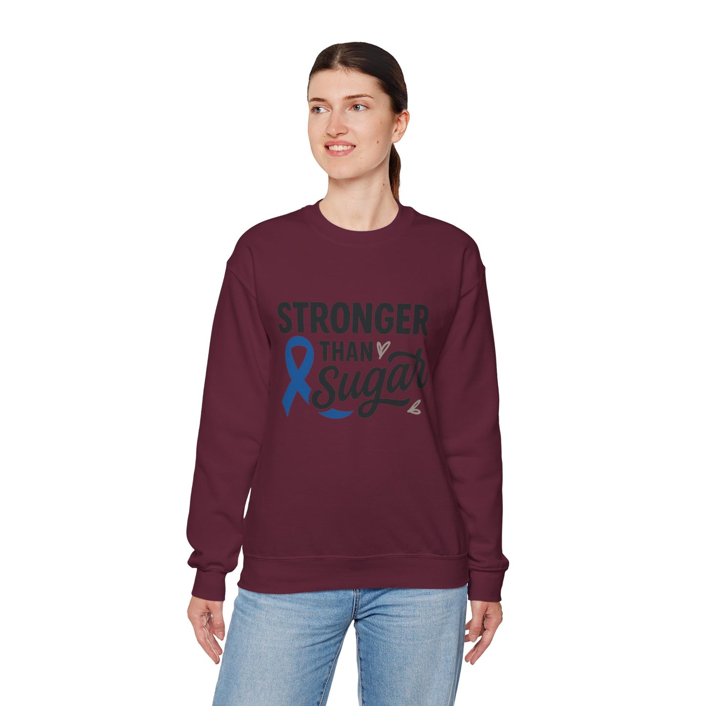 Female model in maroon Stronger Than Sugar sweatshirt — fleece crewneck for diabetes awareness and lifestyle empowerment from Makin’ It By Lady Ev.