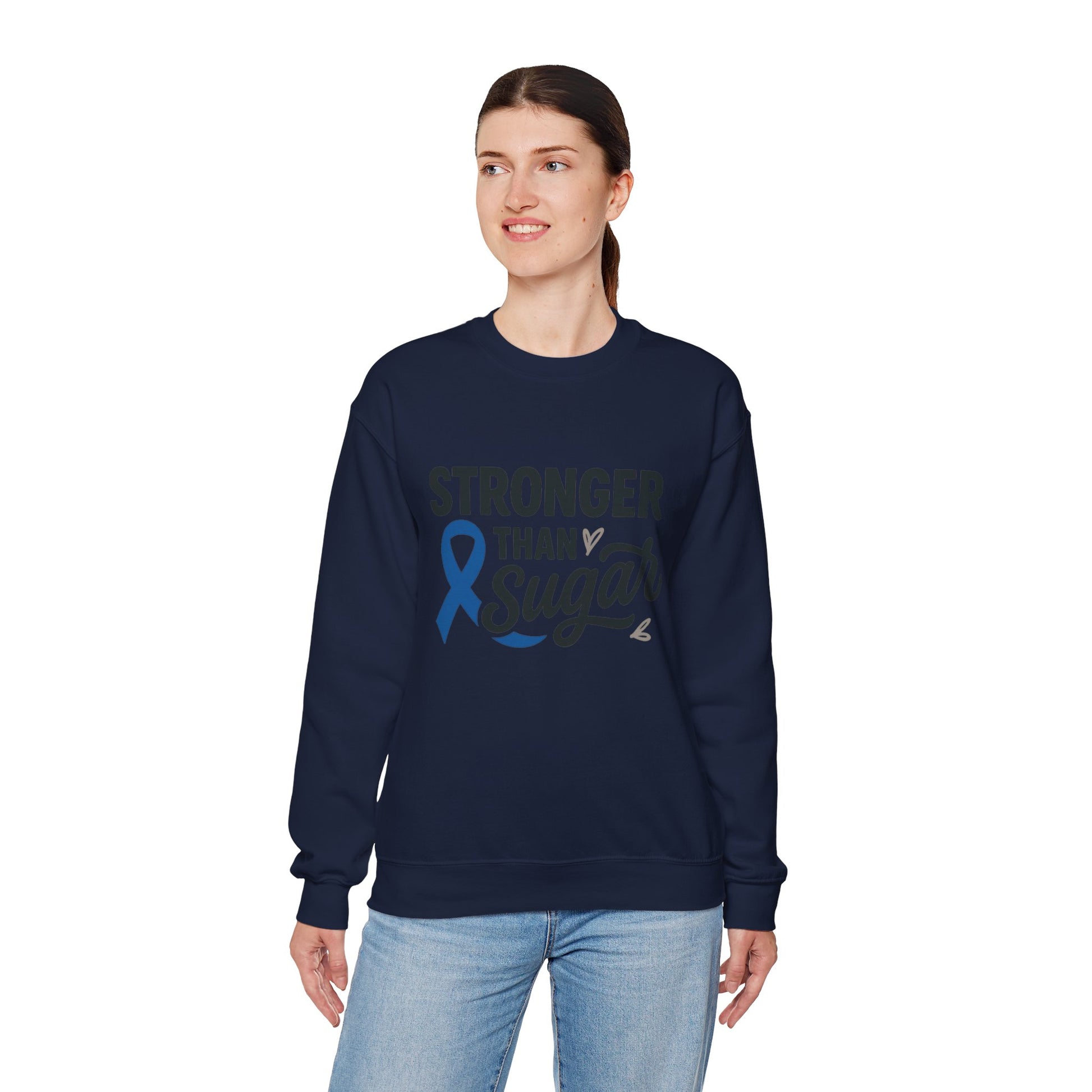 Female model in navy Stronger Than Sugar sweatshirt — cozy unisex fleece promoting diabetes awareness, unity, and strength through style.