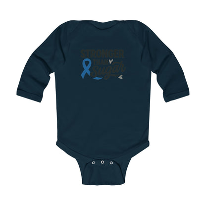 Navy blue Stronger Than Sugar infant onesie with awareness ribbon — soft baby bodysuit for supporting diabetes awareness and family empowerment.