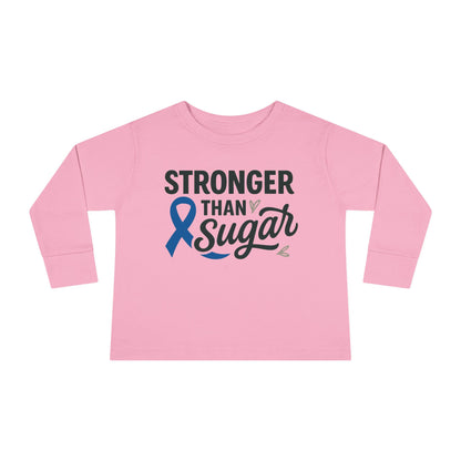 Main view of pink Stronger Than Sugar toddler long sleeve shirt — soft cotton awareness tee for kids supporting diabetes strength and hope.