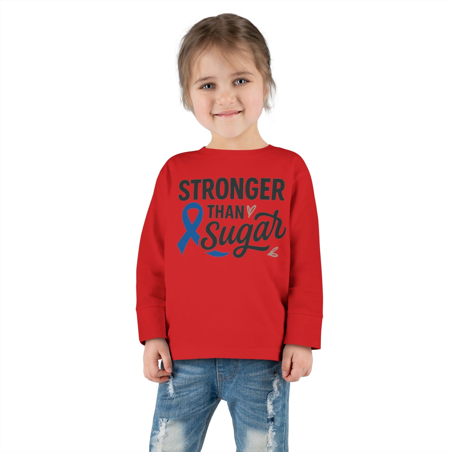 Toddler girl in red Stronger Than Sugar long sleeve shirt — cute kids diabetes awareness top encouraging health confidence and strength.