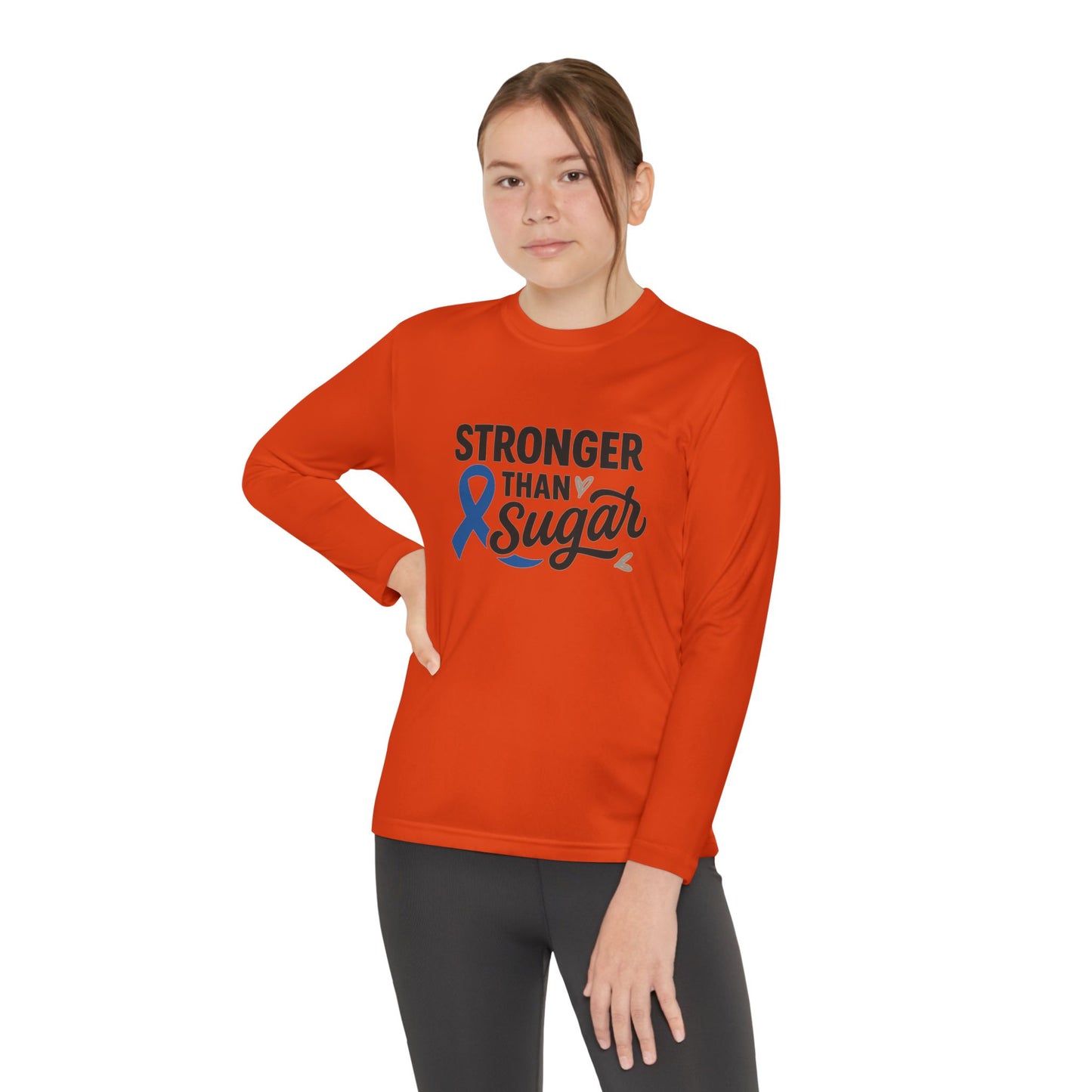 Youth girl wearing Deep Orange Stronger Than Sugar long sleeve shirt — bright diabetes awareness tee inspiring strength, advocacy, and positivity.