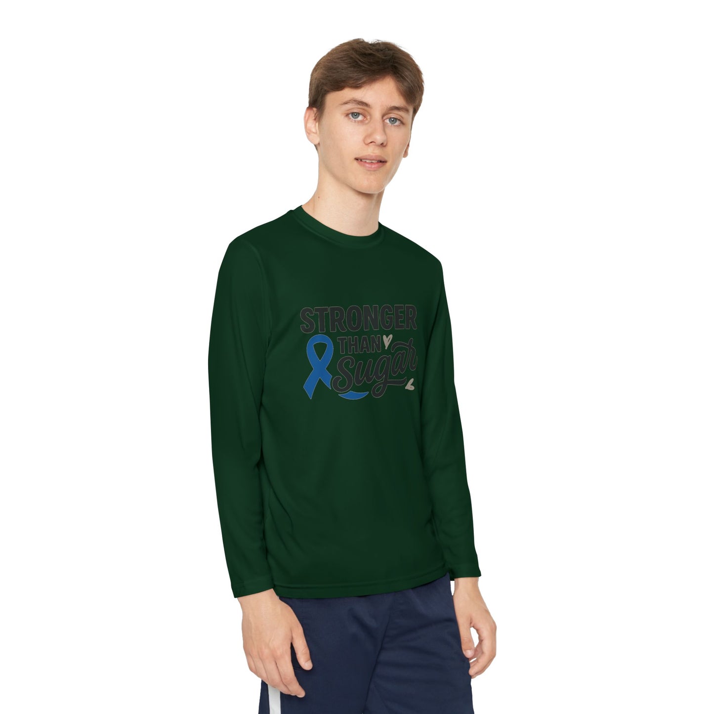 Youth boy wearing Forest Green Stronger Than Sugar long sleeve shirt — unisex diabetes awareness top with blue ribbon design and strong message.