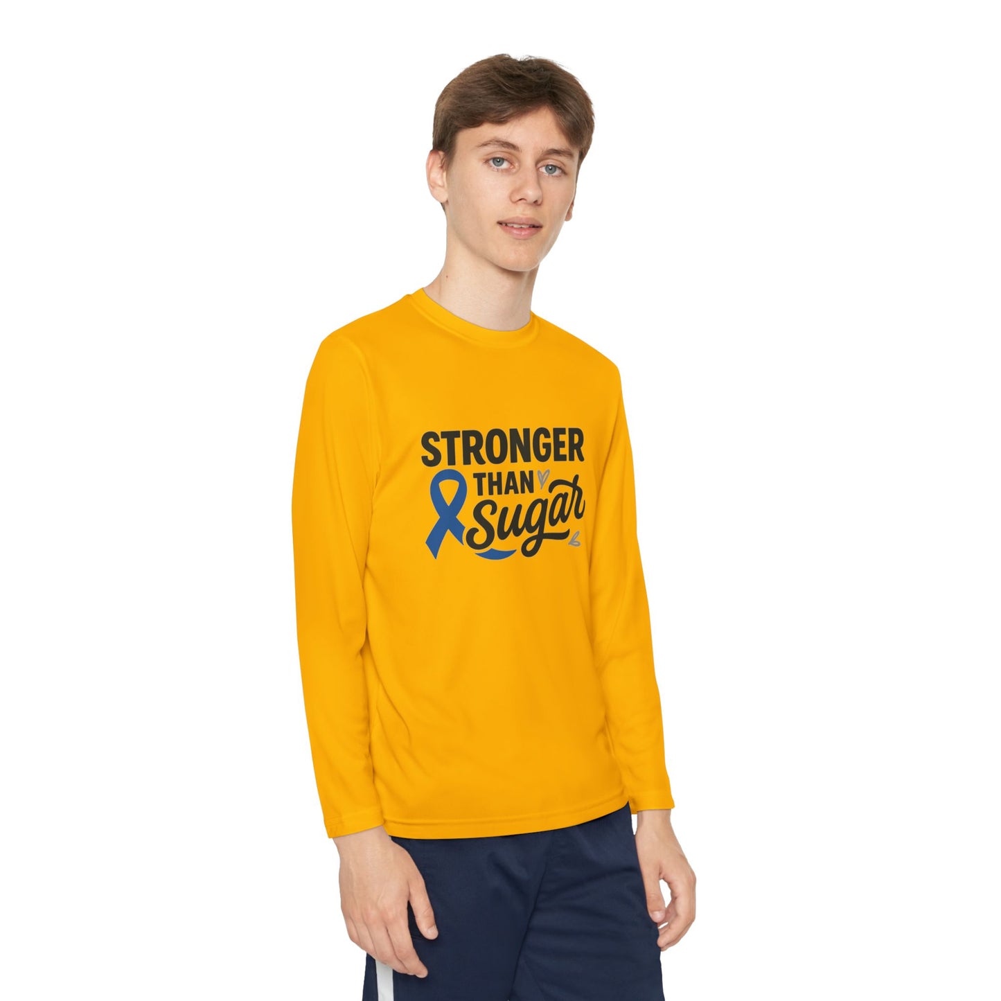 Youth boy wearing Gold Stronger Than Sugar long sleeve shirt — bright yellow awareness top featuring blue ribbon and uplifting message of diabetes strength.
