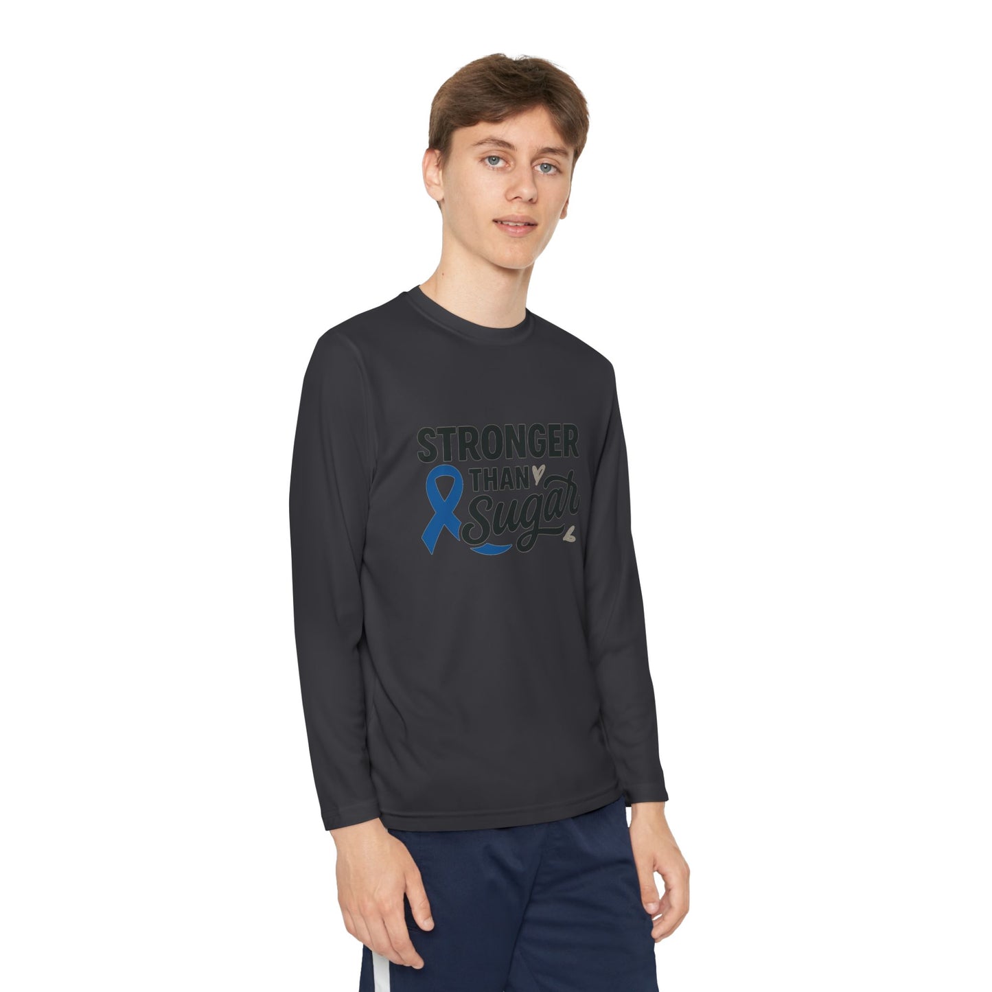 Youth boy wearing Iron Grey Stronger Than Sugar long sleeve shirt — unisex awareness top with blue ribbon design celebrating diabetes strength and advocacy.