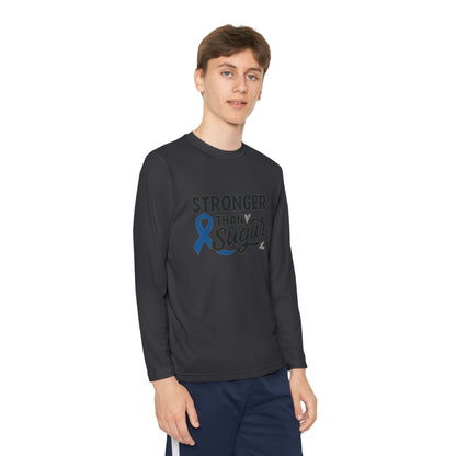 Youth boy wearing Iron Grey Stronger Than Sugar long sleeve shirt — unisex awareness top with blue ribbon design celebrating diabetes strength and advocacy.