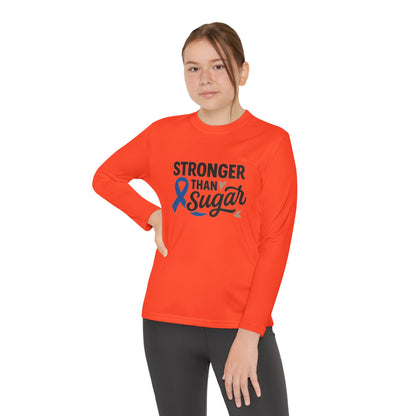 Youth girl wearing Neon Orange Stronger Than Sugar long sleeve shirt — bright diabetes awareness tee inspiring strength, advocacy, and positivity.