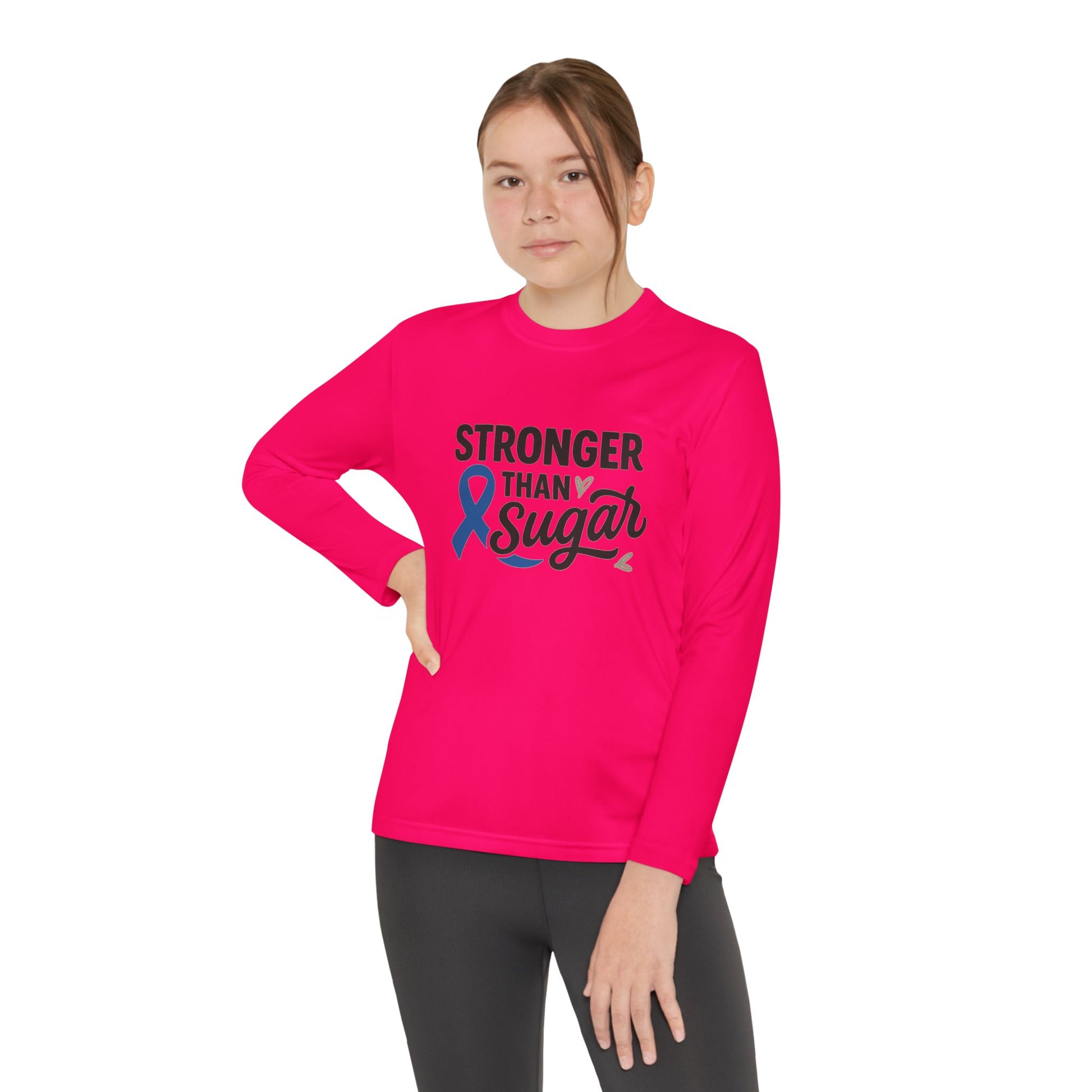 Youth girl in pink raspberry Stronger Than Sugar long sleeve shirt — motivational awareness apparel for kids showing diabetes strength and unity.