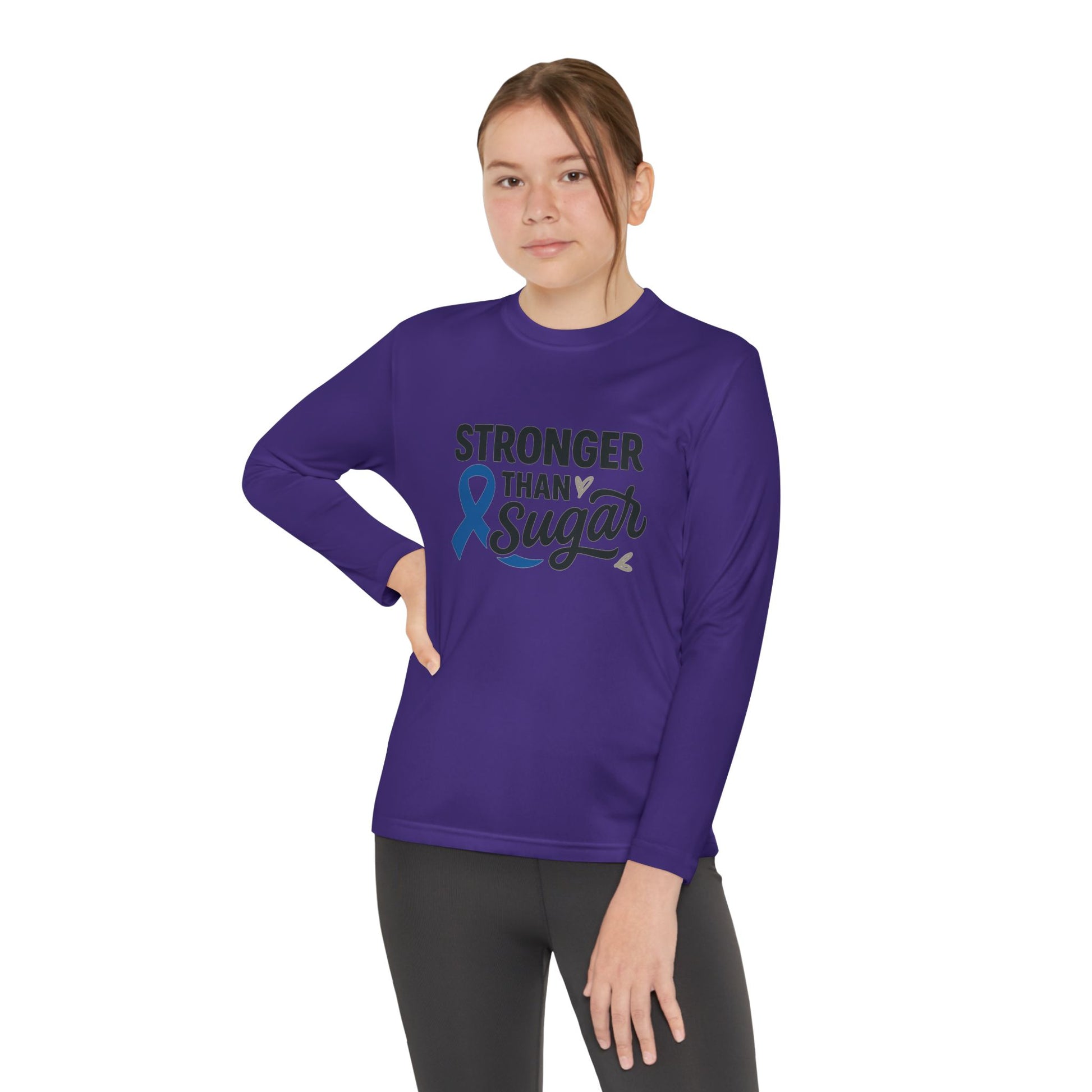 Youth girl in purple Stronger Than Sugar long sleeve shirt — inspiring diabetes awareness apparel symbolizing courage and community support.