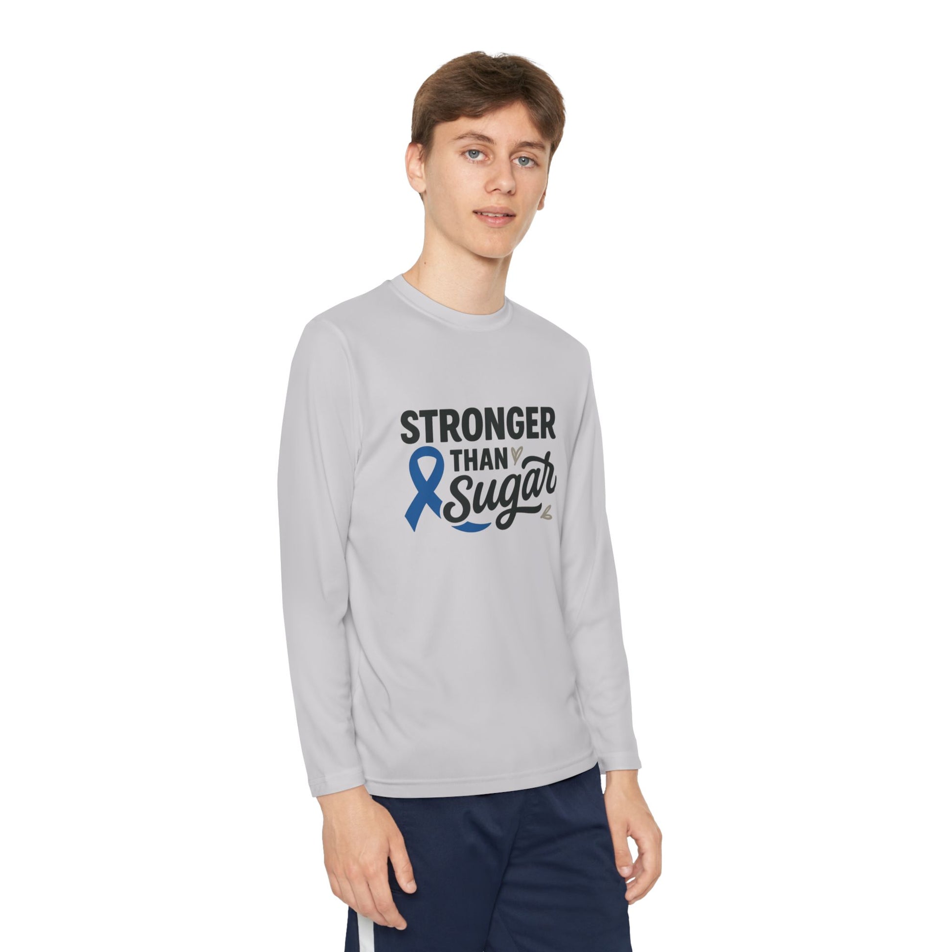 Youth boy wearing Silver Stronger Than Sugar long sleeve shirt — light grey diabetes awareness top with blue ribbon symbolizing hope and courage.