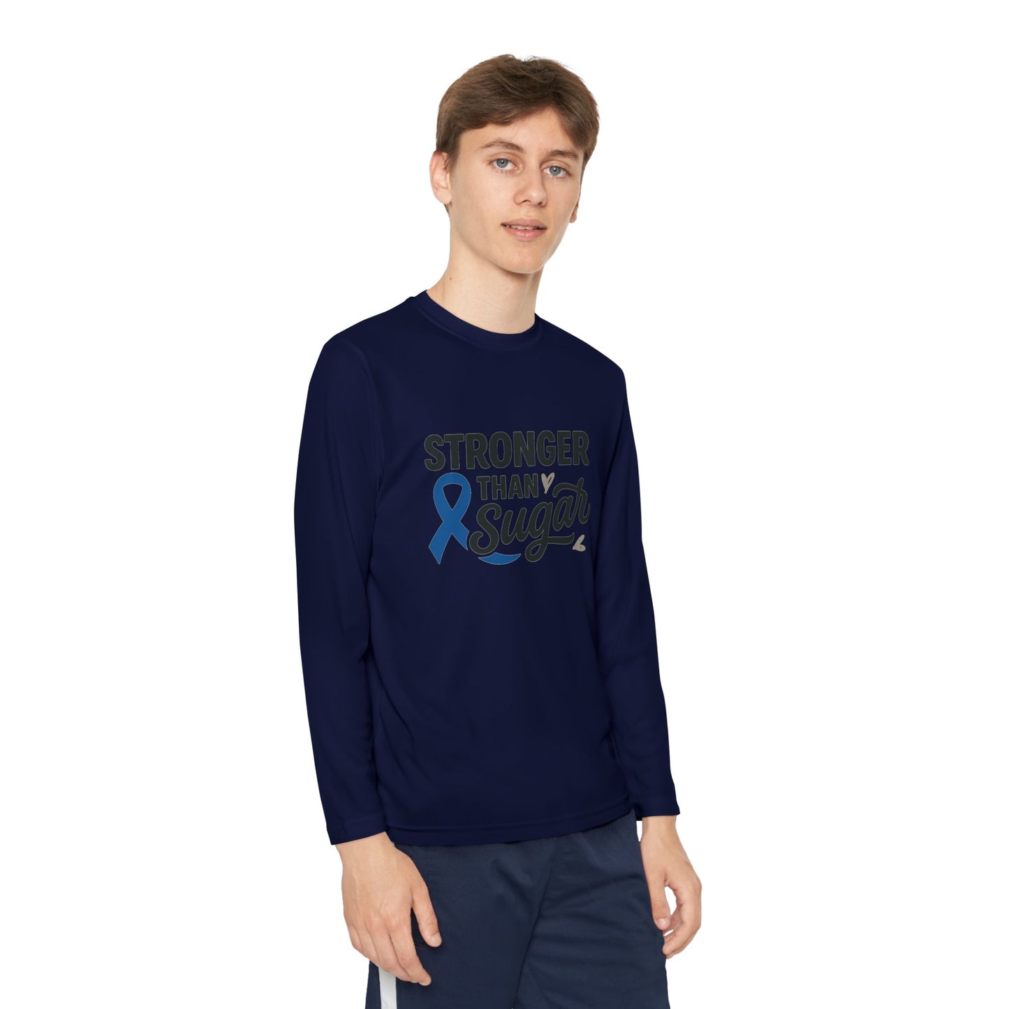 Youth boy wearing True Navy Stronger Than Sugar long sleeve shirt — classic diabetes awareness tee with blue ribbon and motivational message.