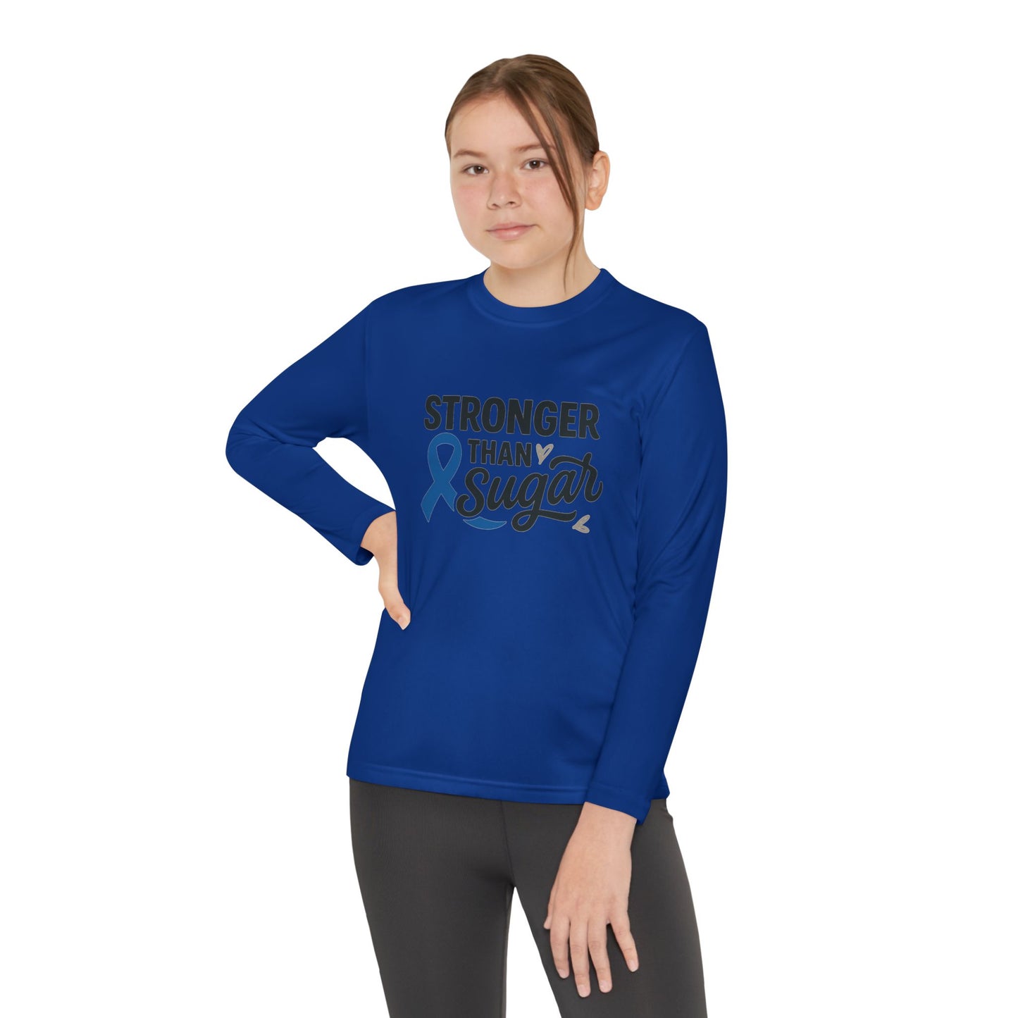 Youth girl wearing True Royal Stronger Than Sugar long sleeve shirt — unisex awareness tee for diabetes advocacy, confidence, and positivity.