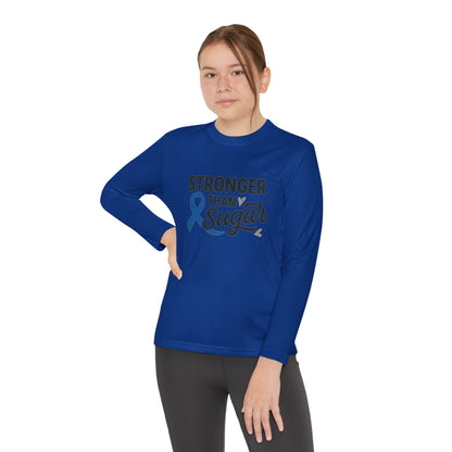 Youth girl wearing True Royal Stronger Than Sugar long sleeve shirt — unisex awareness tee for diabetes advocacy, confidence, and positivity.