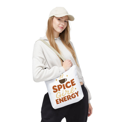 Woman wearing white “Spice Girl Energy” tote bag with beige straps — modern fall tote bag for cozy coffee runs and casual outfits.