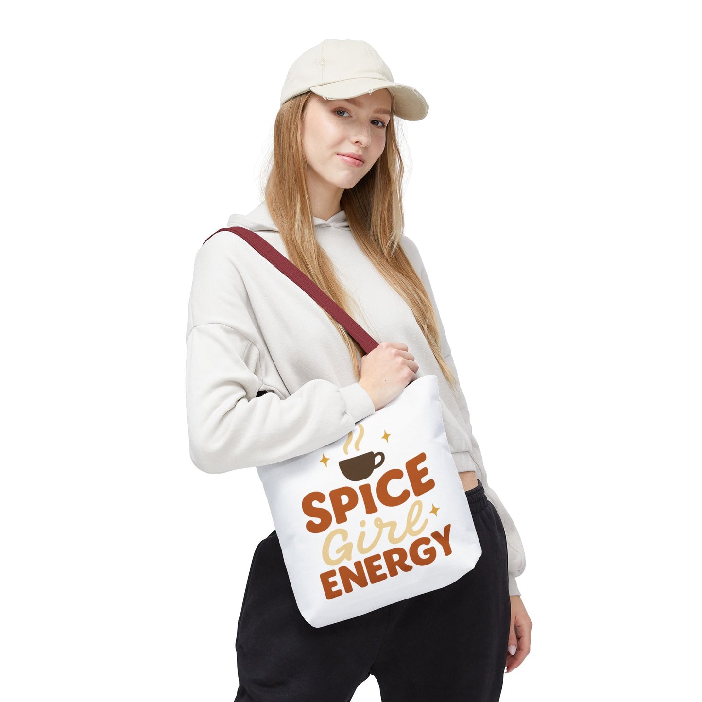 Woman wearing white “Spice Girl Energy” tote bag with red handles — fall coffee aesthetic tote for cozy outfits and warm-toned style.